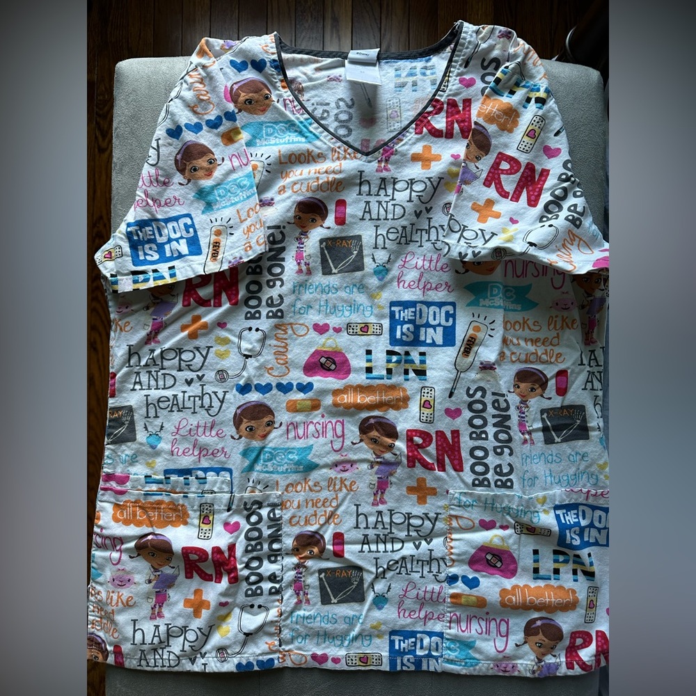 Doc McStuffins scrub top- size medium